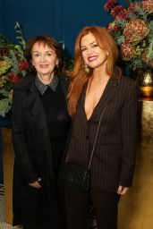 Isla Fisher Commands Vogue x Audemars Piguet Party in Pinstripes
