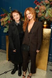 Isla Fisher Commands Vogue x Audemars Piguet Party in Pinstripes