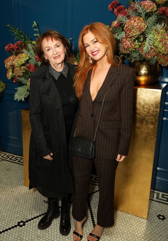 Isla Fisher Commands Vogue x Audemars Piguet Party in Pinstripes