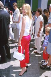Jeri Ryan Attends ‘Rocky and Bullwinkle’ Premiere in Scarlet Slit Pants – LA 2000