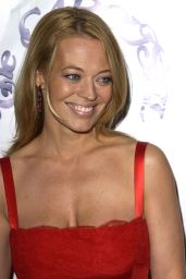 Jeri Ryan Embodies Gala Glamour in Strappy Crimson Lace Column