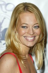 Jeri Ryan Embodies Gala Glamour in Strappy Crimson Lace Column