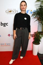 Lily James Attends BGC Charity Day in Pinstripe Ease – London, Sept 11, 2025