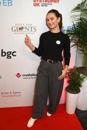 Lily James Attends BGC Charity Day in Pinstripe Ease – London, Sept 11, 2025