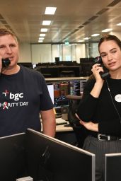 Lily James Attends BGC Charity Day in Pinstripe Ease – London, Sept 11, 2025