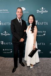 Lucy Liu Revives Tea Party Glamour In Textured White Halter Midi