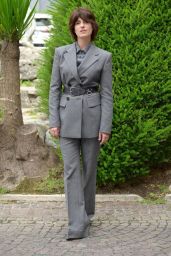 Maria Chiara Giannetta Commands Blanca Premiere in Belted Grey Precision