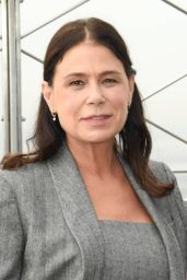 Maura Tierney Commands Empire State Building in Grey Tailoring