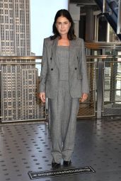 Maura Tierney Commands Empire State Building in Grey Tailoring