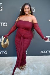Nzinga Imani Rich Red Carpet Look