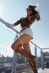 Olivia Ponton Embodies Fall 2025 Seventies Rooftop Chic