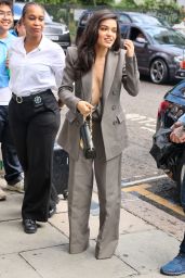 Rachel Zegler Braless Power Suit Turns Heads at London Vinyl Signing