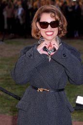 Raye Unveils Neo-Noir Elegance at the Burberry Show