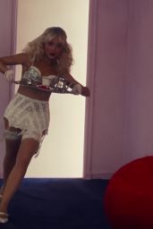 Sabrina Carpenter Unveils Surrealist Americana in “Tears” August 2025