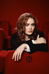 Sadie Sink Embodies Armani Cinema in Leaned-Back Noir Ease