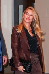 Scarlett Johansson Ignites New York with Moody Neutrals and a Millennial Side Part