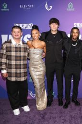Sydney Thomas Debuts Netflix Cast Party in Pearl-Clutch Noir