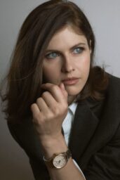 Alexandra Daddario’s Power Pose: TAG Heuer Carrera Date Elegance in Paris