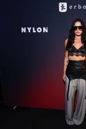 Demi Lovato Champions Power Tailoring and Lace for Nylon Party Performance