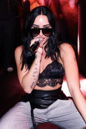 Demi Lovato Champions Power Tailoring and Lace for Nylon Party Performance