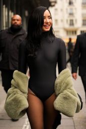 Demi Lovato Wears Second Skin Bodysuit and Faux Fur at Coperni
