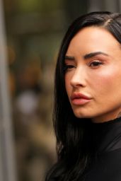 Demi Lovato Wears Second Skin Bodysuit and Faux Fur at Coperni