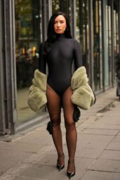 Demi Lovato Wears Second Skin Bodysuit and Faux Fur at Coperni