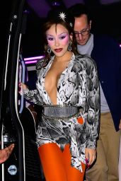 Doja Cat Embraces Maximalist Contrast in Plunging Serpent Print