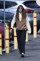 Elizabeth Olsen in Knit Vest and Loafers for Netflix Office Visit