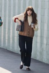 Elizabeth Olsen in Knit Vest and Loafers for Netflix Office Visit