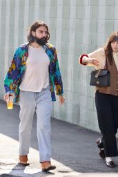 Elizabeth Olsen in Knit Vest and Loafers for Netflix Office Visit
