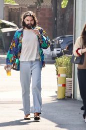 Elizabeth Olsen in Knit Vest and Loafers for Netflix Office Visit