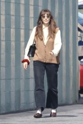 Elizabeth Olsen in Knit Vest and Loafers for Netflix Office Visit