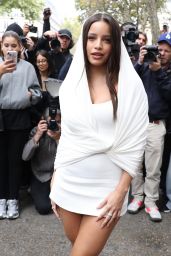 Emilia Mernes Showcases Architectural White Mini With Hooded Wrap at Paris Fashion Week 2025