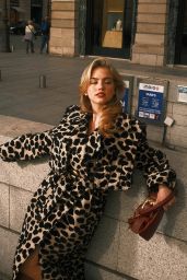 Emma Brooks in Cow Print Drama: A 2025 Statement of Bold Minimalism