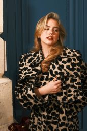 Emma Brooks in Cow Print Drama: A 2025 Statement of Bold Minimalism