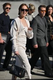 Emma Stone Selects Chic Louis Vuitton Ribbed Dress for Paris Fashion Week