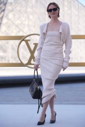 Emma Stone Selects Chic Louis Vuitton Ribbed Dress for Paris Fashion Week