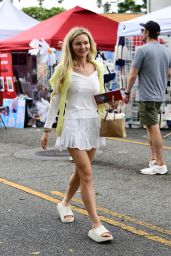 Gia Skova Channels Resort Chic in Layered White Ensemble
