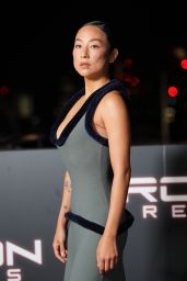 Greta Lee Showcases Sculptural Maxi Dress at Tron Ares London Sneak Peek