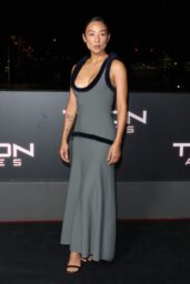 Greta Lee Showcases Sculptural Maxi Dress at Tron Ares London Sneak Peek
