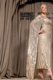 Hannah Waddingham In Glittering Gold Column Gown With Cape At Albies