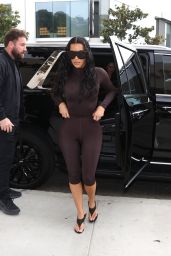Kim Kardashian Embraces Monochromatic Skin-Tight Aesthetic for Brand Launch