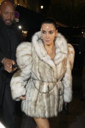 Kim Kardashian Embraces Oversized Fur and Power Shoulders in Paris