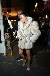 Kim Kardashian Embraces Oversized Fur and Power Shoulders in Paris