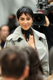 Kim Kardashian Masterfully Wears Trench Coat at Maison Margiela Spring 2026