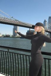 Reneé Rapp in Black Velvet Gown with Reflective Embellishments