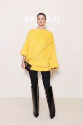 Taylor Hill Masters Parisian Edge in Balmain’s Bold Yellow Knit at Paris Fashion Week