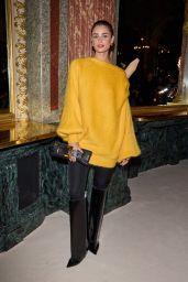 Taylor Hill Masters Parisian Edge in Balmain’s Bold Yellow Knit at Paris Fashion Week