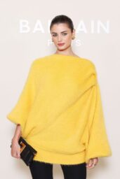 Taylor Hill Masters Parisian Edge in Balmain’s Bold Yellow Knit at Paris Fashion Week